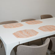 Acrylic marbled hexagon trays set on the table 